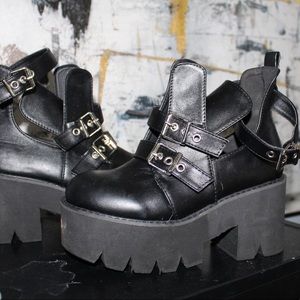 Black chunky buckle up boots